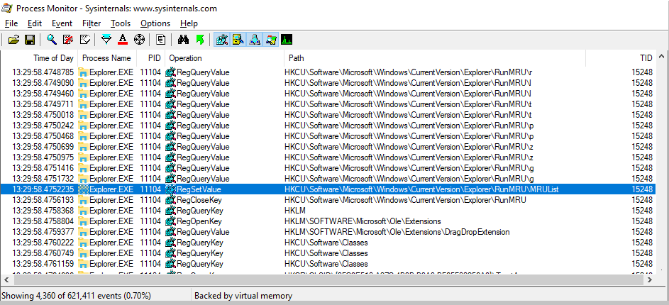 Process Monitor shows registry-write events, accessing a key named RunMRU